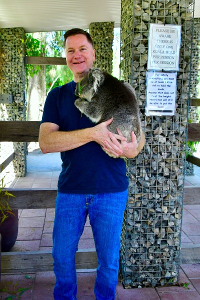 Happily Holding a Koala